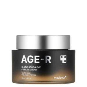 A dark gradient glass jar of Medicube AGE-R Glutathione Glow Capsule Cream topped with a metallic silver lid.