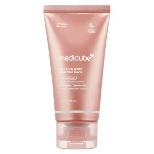 A metallic rose gold squeeze tube of Medicube Collagen Night Wrapping Mask standing upright with a clear cap.
