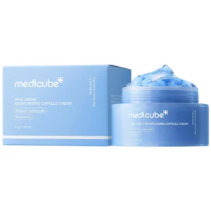 Open light blue jar of Medicube Hyaluronic Moisturizing Capsule Cream filled with blue moisture capsules next to its matching packaging box.
