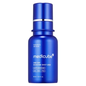 A metallic royal blue bottle of Medicube One Day Exosome Shot 2000 with a silver accent ring against a plain white background.