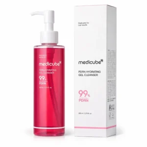Translucent deep pink pump bottle of Medicube PDRN Hydrating Gel Cleanser standing next to its white and pink product box.