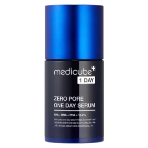 Front view of a dark blue cylindrical bottle of Medicube Zero Pore One Day Serum with a metallic blue pump cap.